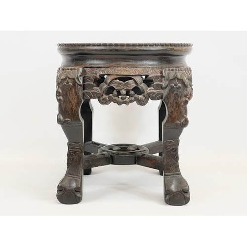 9 - A late 19th century Chinese carved padauk Wood jardiniere stand, with marble top. Circa 1890-1900. 3... 