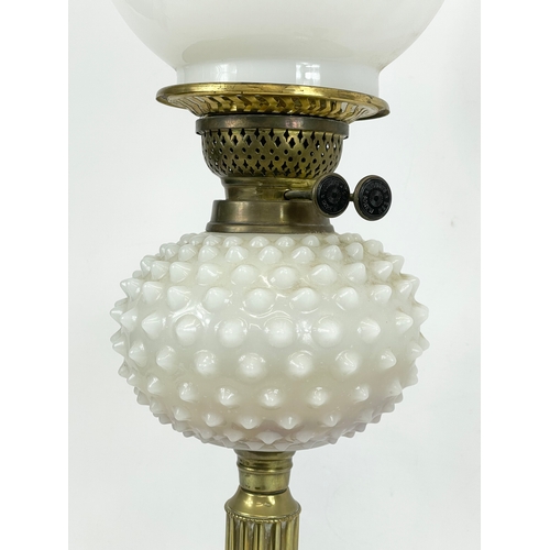 11 - A 19th century Victorian brass and Milk Glass oil lamp, with double burner. By Young’s. Screw No1. 7... 