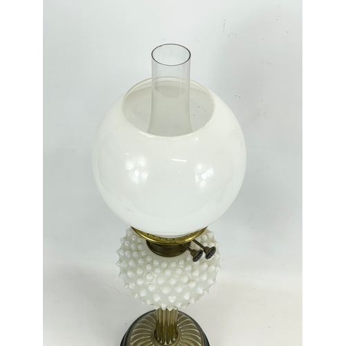 11 - A 19th century Victorian brass and Milk Glass oil lamp, with double burner. By Young’s. Screw No1. 7... 