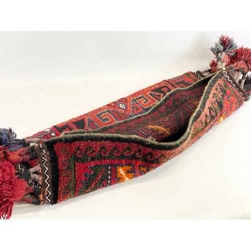44 - An Iranian wool pile / rug. Kurdish. 113 x 44cm