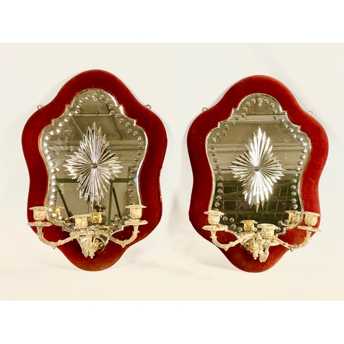 73 - A pair of Victorian ‘Sorcerers’ mirrors, with gilt sconces. 41 x 57cm