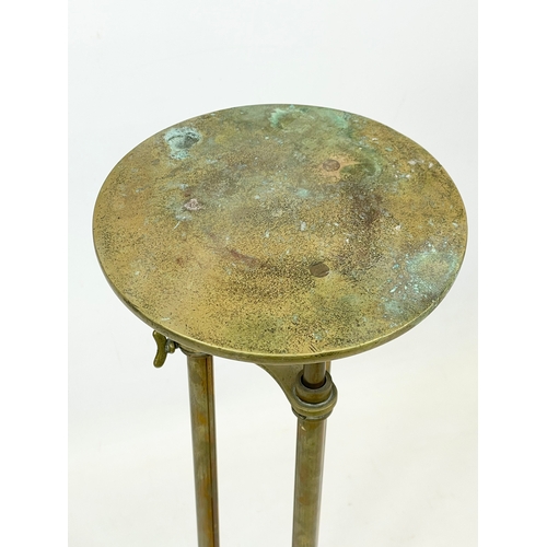 75 - An early 20th century brass telescopic shop display stand by Finlay of London. Lowest height 41.5cm.... 
