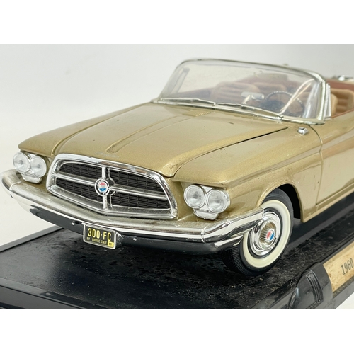 143 - A good quality model car. 1960 Chrysler 300F. Road Signature. 35cm
