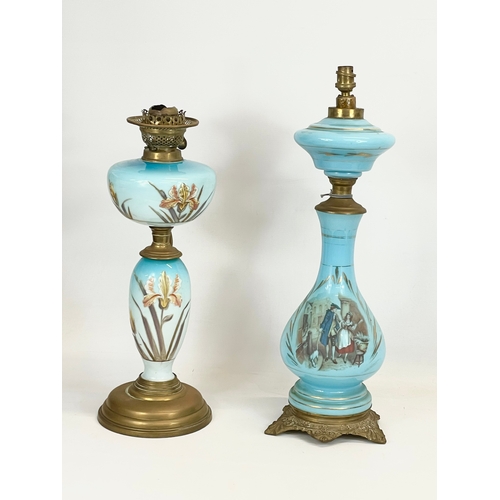 86 - 2 large late 19th century glass and brass converted oil lamps. 59cm