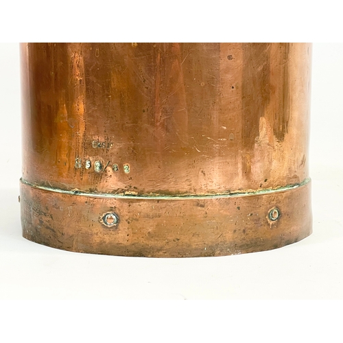 87 - A tall 19th century heavy copper bucket with brass handle. 26 x 56cm including handle.