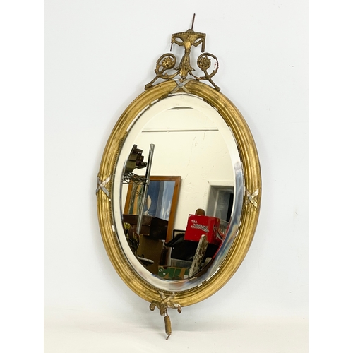 90 - A late 19th gilt framed mirror. 30 x 56cm
