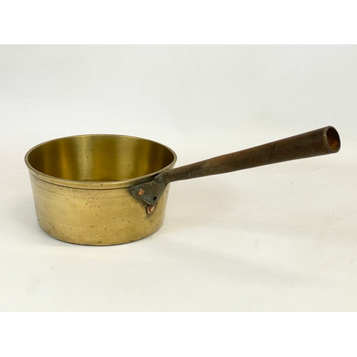 92 - A Victorian brass pot. 39.5cm