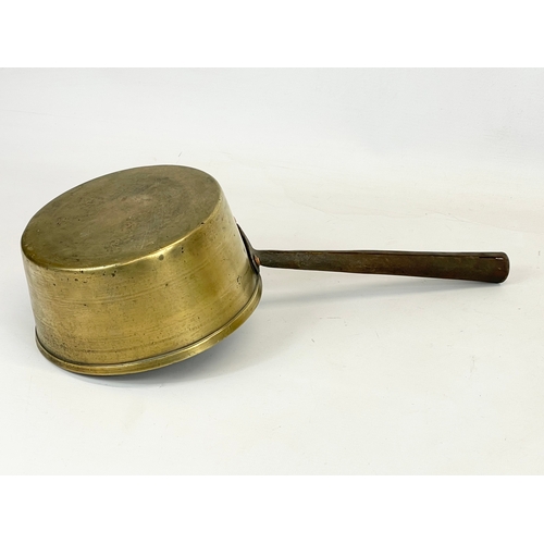 92 - A Victorian brass pot. 39.5cm
