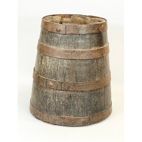 97 - A Victorian oak metal bound barrel. 36 x 40cm