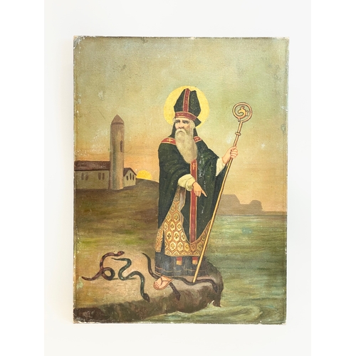 114 - A late 19th century oil painting on board of Saint Patrick. 45 x 61cm