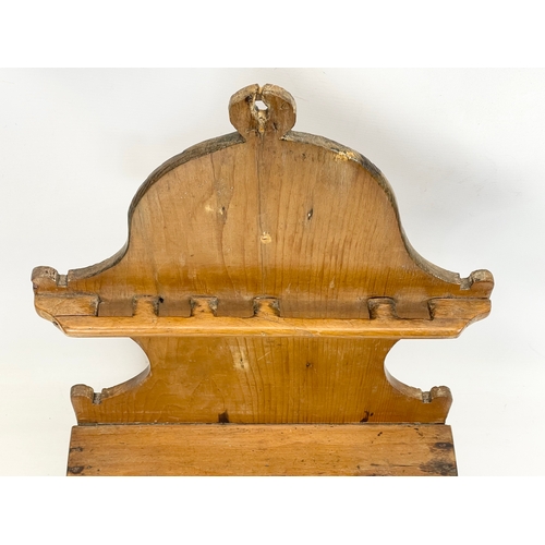 117 - A Victorian pine combination cutlery rack and candle box. 33 x 17 x 56cm