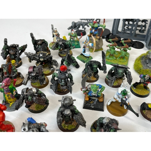 159 - A collection of Warhammer 40,000 models. Including lead models from 1992 1998 etc.