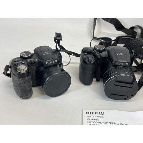 181 - 4 Fujifilm cameras. Finepix S x3 and a Finepix S500