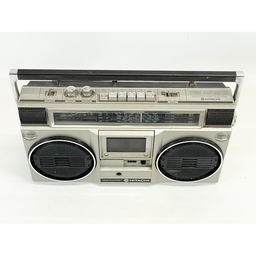 186 - A Hitachi stereo radio cassette recorder. 42cm. With lead