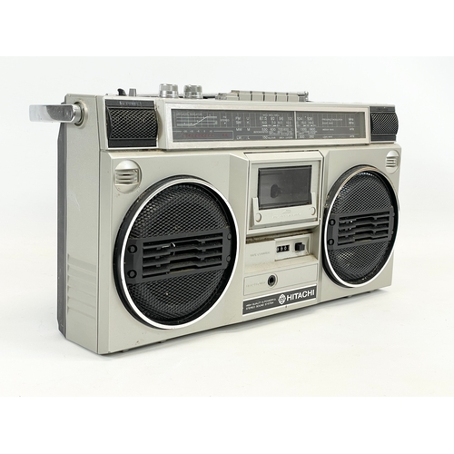 186 - A Hitachi stereo radio cassette recorder. 42cm. With lead