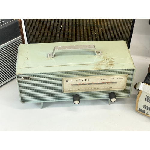 189 - A collection of vintage radios. Hitachi T-635S, Hacker Hunter Radio LTD VHF, Vega Spidola, Grundig M... 