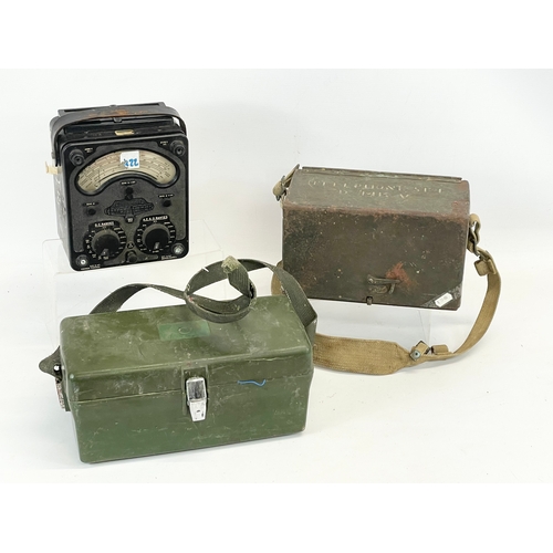 195 - A collection of military items. A military field telephone, an ammo box, a telephone set and morse c... 