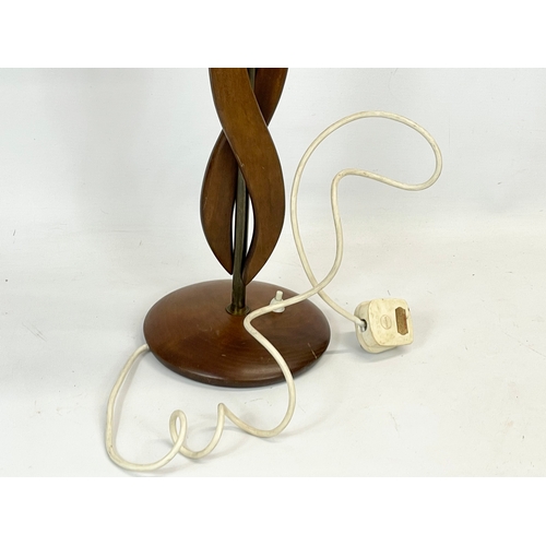 118 - A tall Mid Century teak table lamp. 1960’s. 53cm without shade.