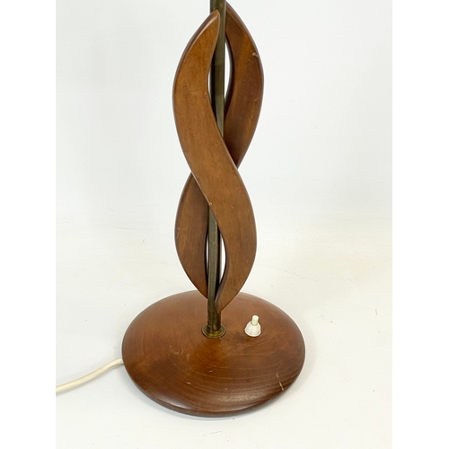 118 - A tall Mid Century teak table lamp. 1960’s. 53cm without shade.
