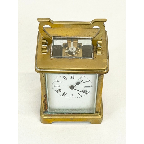 230 - A late 19th century French brass carriage clock by R & C Paris. with key. Working. 8.5x7x15cm includ... 