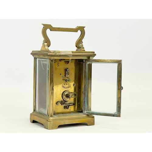 230 - A late 19th century French brass carriage clock by R & C Paris. with key. Working. 8.5x7x15cm includ... 