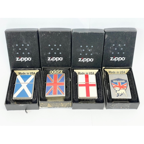 233 - 4 Zippo lighters in boxes.