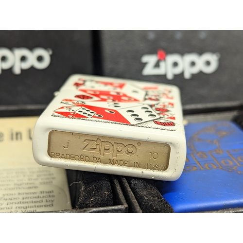 236 - 4 Zippo lighters in boxes.