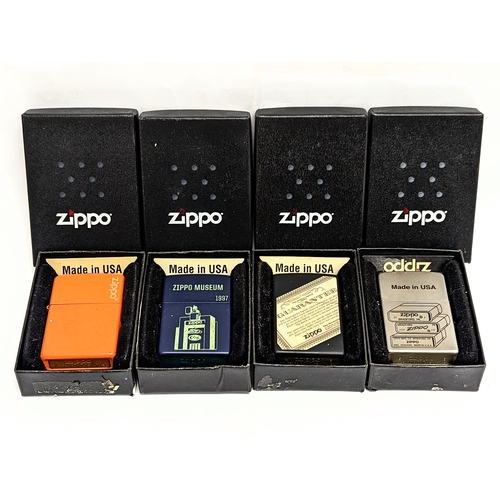 238 - 4 Zippo lighters in boxes.