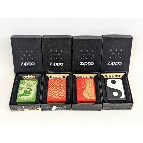 241 - 4 Zippo lighters in boxes