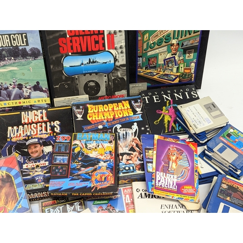 196I - A large quantity of Commodore Amiga games, Amiga floppy disks, Amiga magazines, etc.