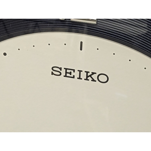 762 - A Seiko wall clock. 33.5cm