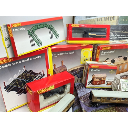 196L - A large collection of mostly Hornby Railways train models and tracks, including The Flying Scotsman ... 