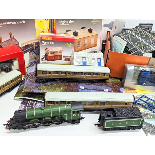 196L - A large collection of mostly Hornby Railways train models and tracks, including The Flying Scotsman ... 