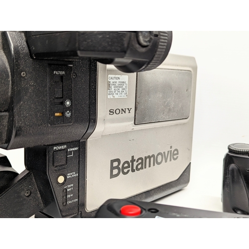 196P - A Sony Betamovie BMC 110, with 3 other cameras, 2 cases, etc.