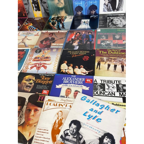 196Q - A collection of LP, vinyl records. Including Iron Maiden, The Clancy Brothers, The Dubliners, Glen B... 