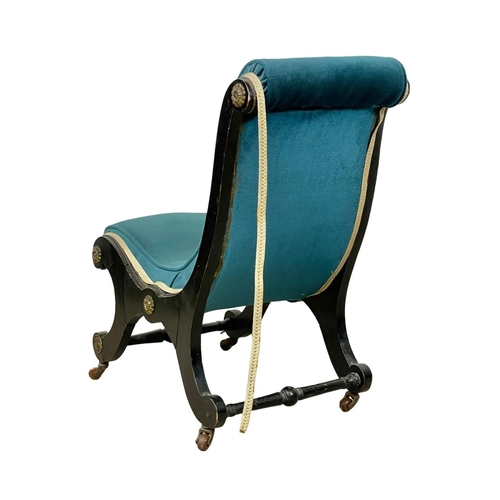 23 - 2 late Victorian ebonised nursing chairs. 1880’s.