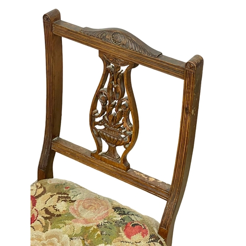 43 - An Edwardian nursing chair with tapestry seat.