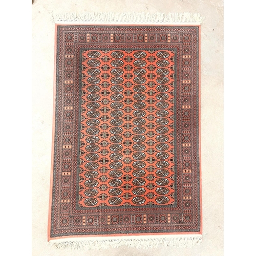 46 - A Bokhara style rug. 119 x 190cm