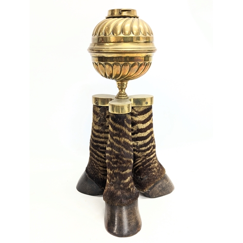 253 - A mid 19th century Victorian brass oil lamp with taxidermy zebra hooves. 42.5cm