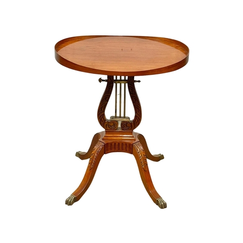 1027 - A Regency style Satinwood side table in the style of Duncan Fyffe. 60 x 45 x 70cm