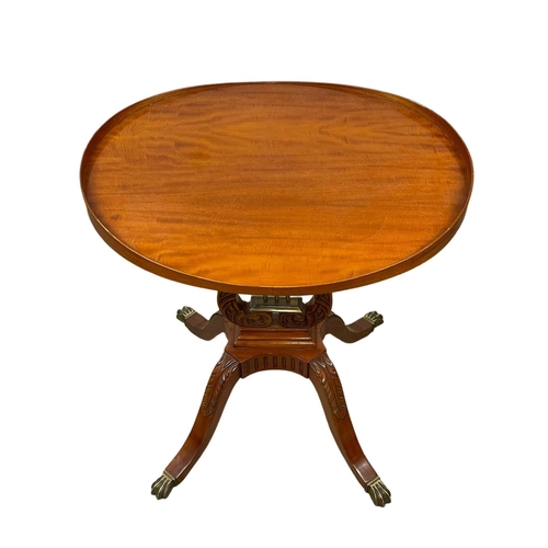 1027 - A Regency style Satinwood side table in the style of Duncan Fyffe. 60 x 45 x 70cm