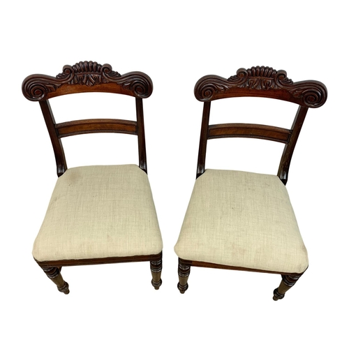 1033 - A pair of early 19th century William IV carved mahogany side chairs. Circa 1830.