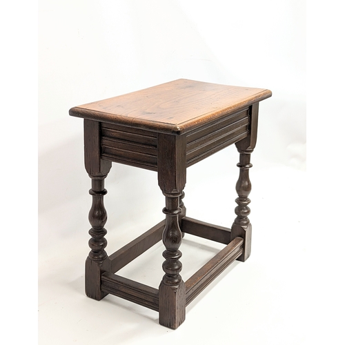 97A - An early 20th century oak join stool. 46x27.5x46.5cm