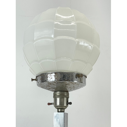 3 - An Art Deco chrome table lamp with glass shade. 1920-1930. 55cm