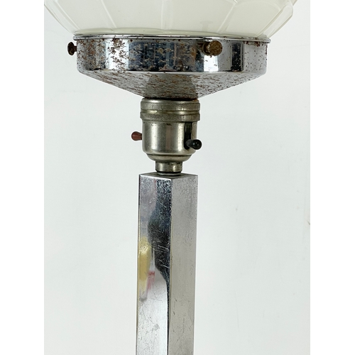 3 - An Art Deco chrome table lamp with glass shade. 1920-1930. 55cm