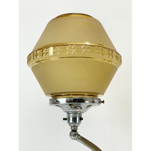 4 - An Art Deco chrome table lamp with glass shade. Circa 1920-1930. 55cm