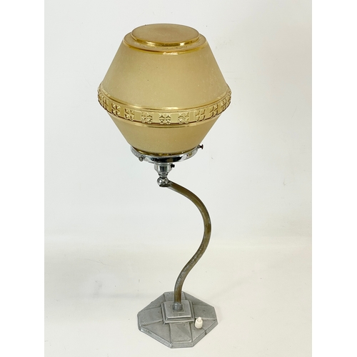 4 - An Art Deco chrome table lamp with glass shade. Circa 1920-1930. 55cm