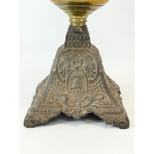 22 - A late Victorian double burner oil lamp. 57cm