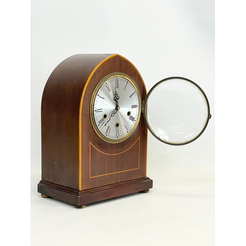 27 - A large Edwardian inlaid mahogany mantle clock. With key and pendulum.  26x16x36cm