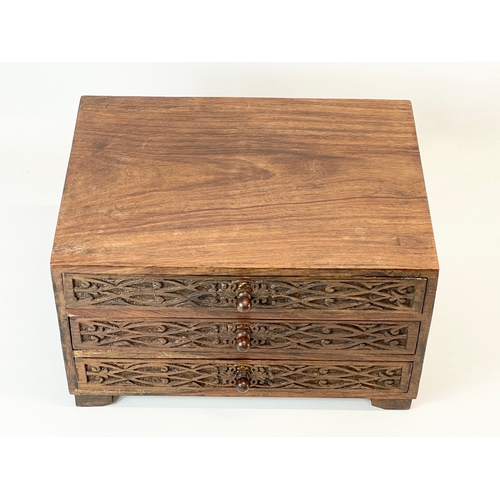 32 - An Indian padauk wood table top chest with 3 drawers. 35x25.5x21cm